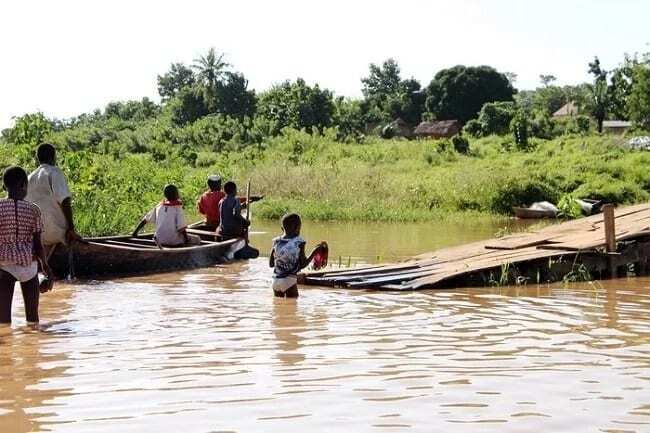 Pupils at Tapa Abotoase in the Volta Region swim to cross river to school