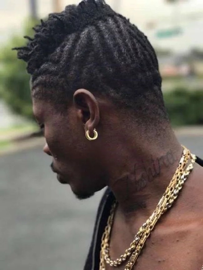 Shatta Wale counts his blessings as he tattoos his daughter's name on his neck
