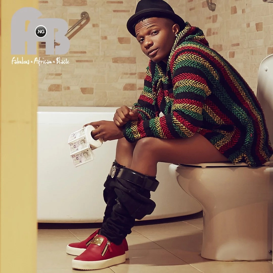 See Wizkid on toilet seat in controversial photo
