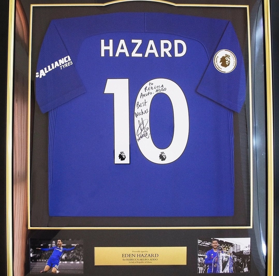 Rebecca Akufo-Addo receives signed Chelsea replica jersey from Eden Hazard