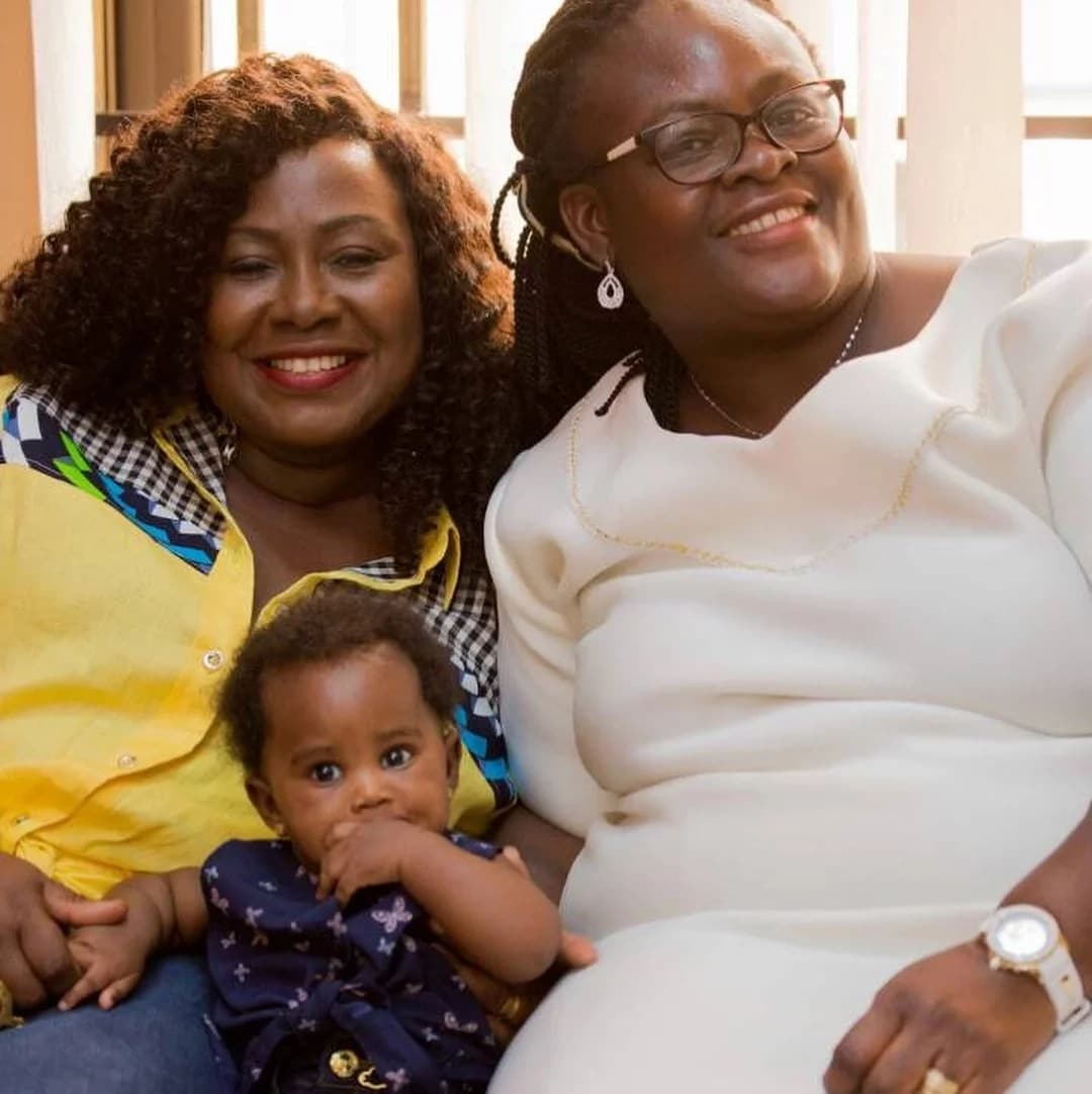Gifty Anti, her baby and a relative