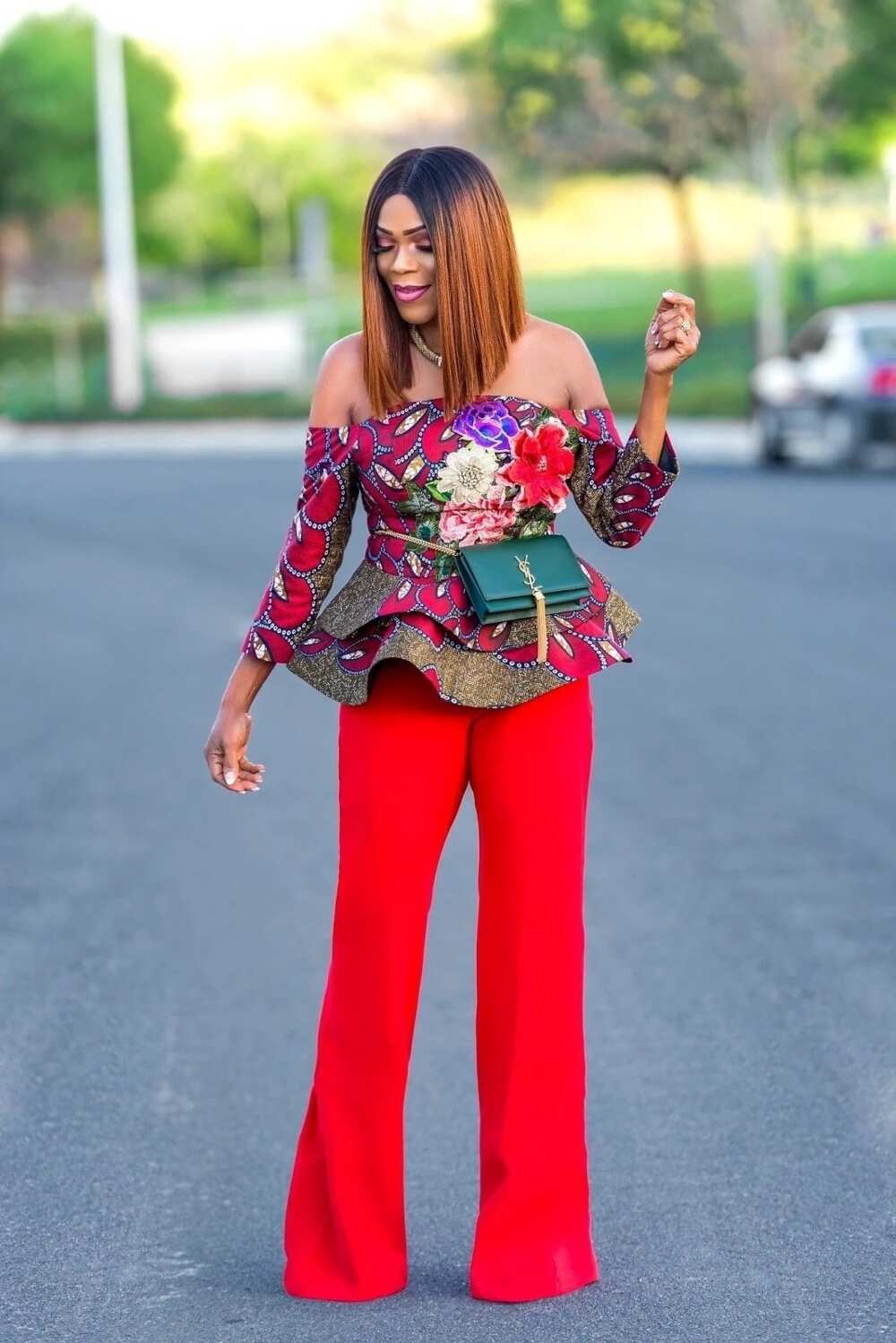 ankara tops for ladies
stylish tops to wear with jeans
ankara blouse on jeans
trendy styles made with ankara
peplum ankara tops
ankara tops designs