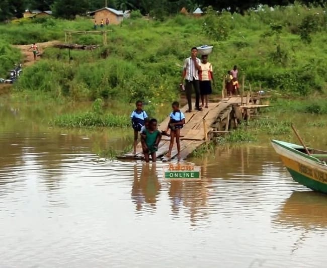 Pupils at Tapa Abotoase in the Volta Region swim to cross river to school