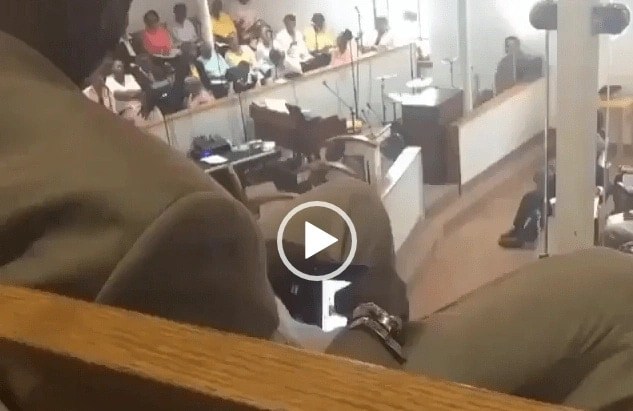 Man caught watching "blue film" during church service