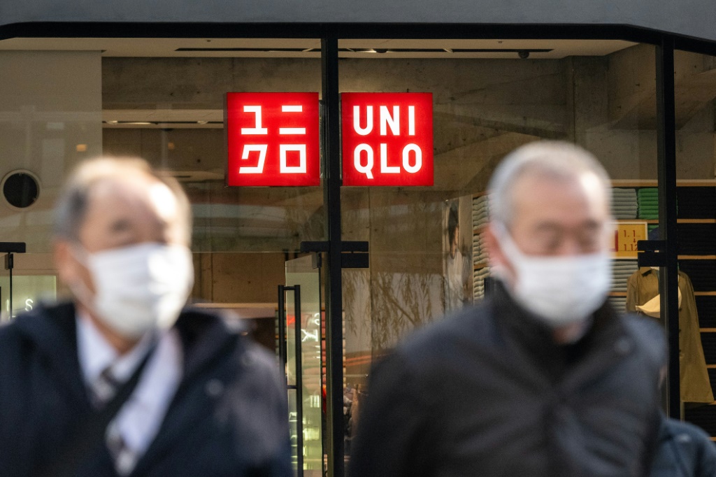 Uniqlo parent company Fast Retailing will raise wages for some employees in Japan by up to 40 percent