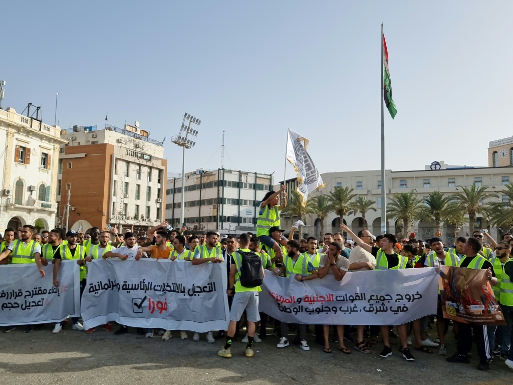 Libyans protest in Martyrs' Square in the heart of the capital Tripoli on Friday