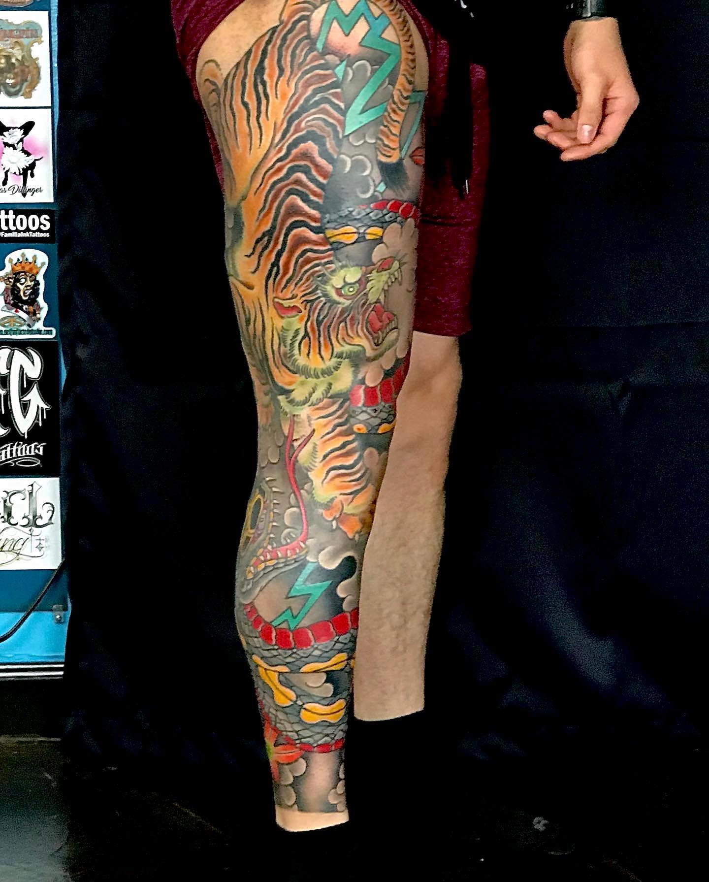 Tiger tattoo on the thigh