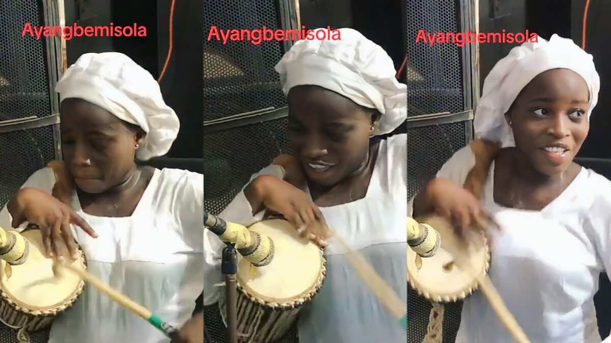 Photo of young lady drumming effortlessly
