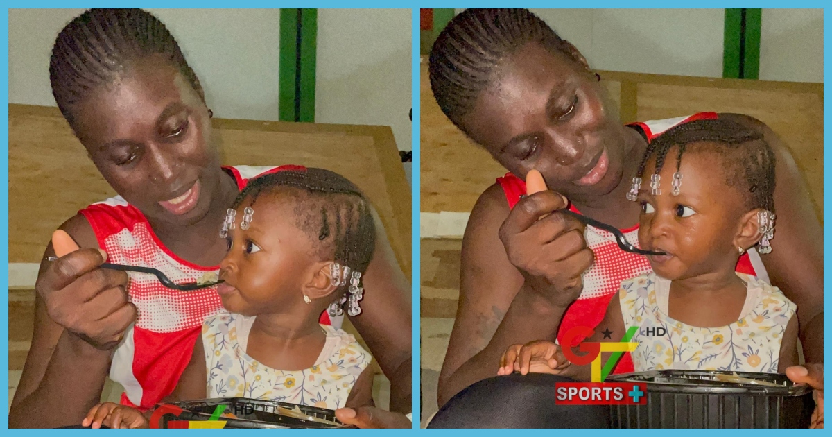 Gambian nursing mother plays in All African Games, netizens gush over photo of her feeding daughter