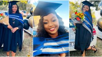 Determined lady earns 3 degrees from university in one day; flaunts her beauty in grad gown; peeps react
