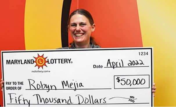Robyn Mejia wins N$50,000 from a Maryland Lottery ticket her husband gifted her.