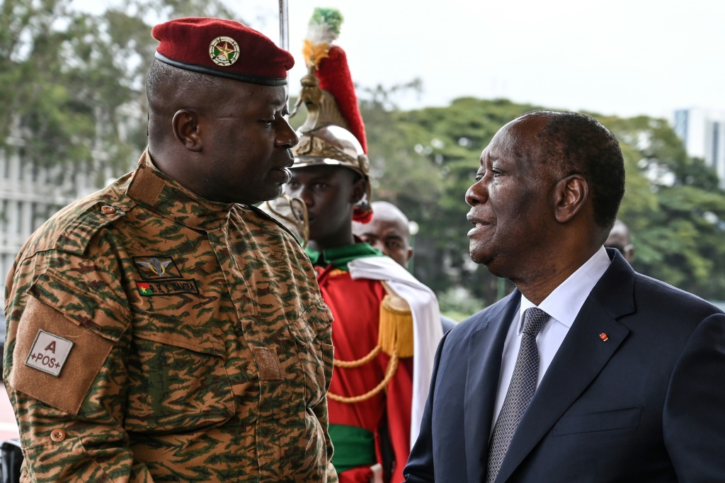 Damiba, left, met with President Alassane Ouattara during his one-day visit to Abidjan for 'friendship and work'