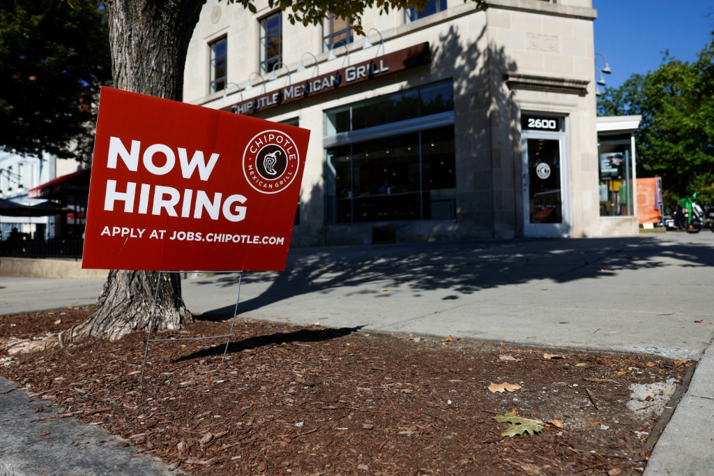 US job gains eased in February but suggest the economy is not cooling as quickly as policymakers hope