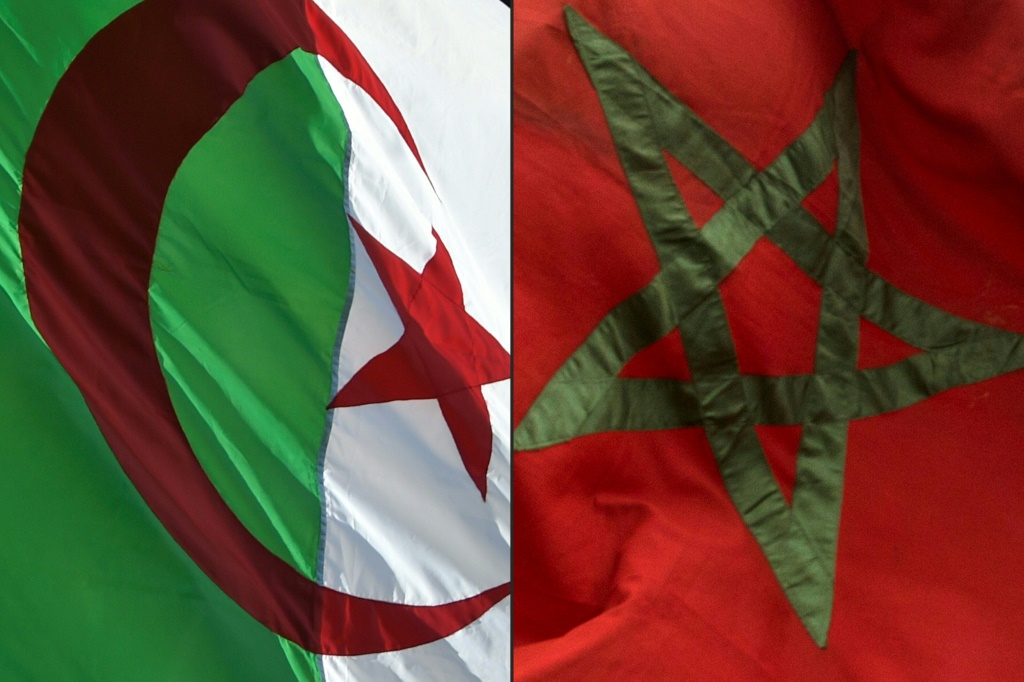 The flags of Algeria (L) and Morocco, rivals each pursuing pipeline projects linked to Nigeria