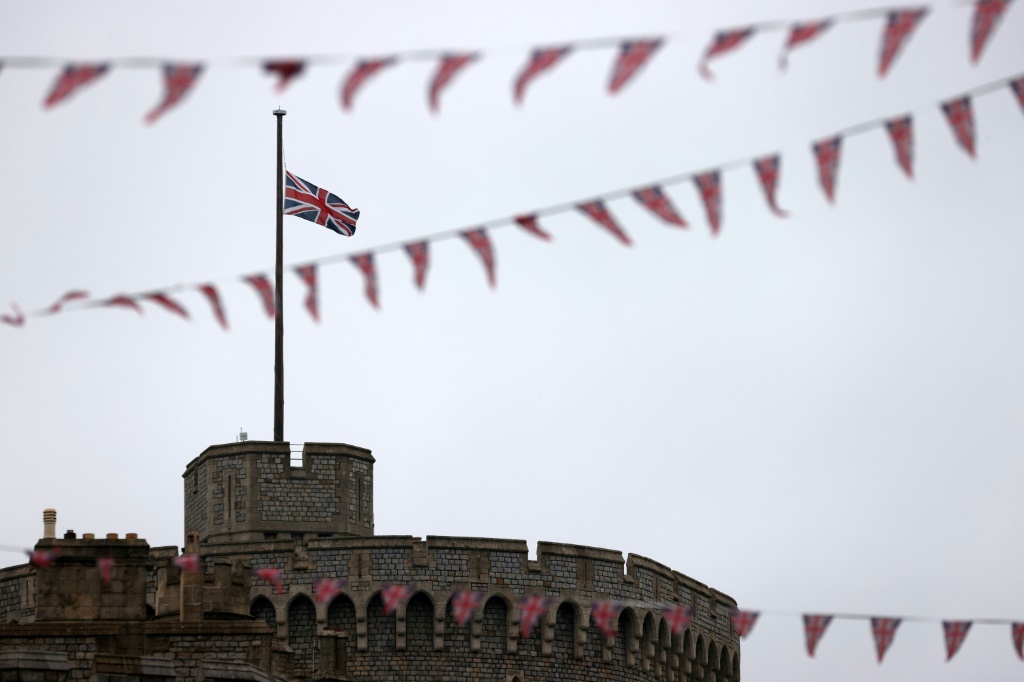 A Union flag flies at half-mast above Windsor Castle, west of London