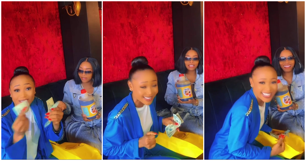 Yandy Smith splashes dollars on Akuapem Poloo for selling a bottle of pure honey from Ghana to her, video emerges