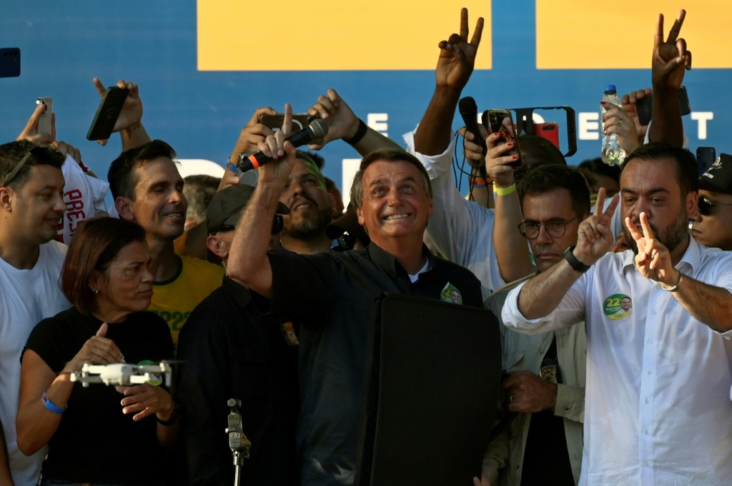 Brazilian President Jair Bolsonaro leads a campaign rally in the Campo Grande neighborhood of Rio de Janeiro, Brazil on October 27, 2022