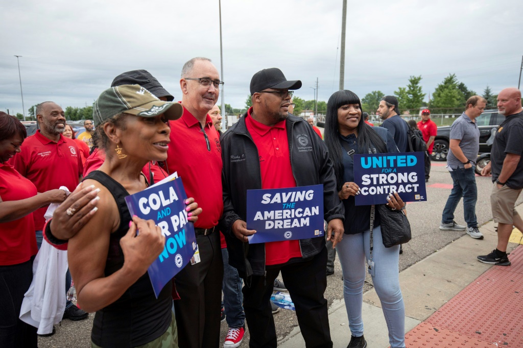 The United Auto Workers expanded a strike to Stellantis' Sterling Heights, Michigan factory, where employees greeted UAW President Shawn Fain in July at the outset of auto contract talks
