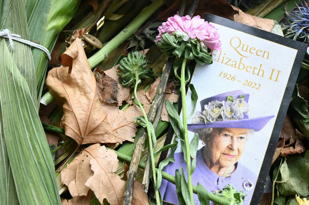The third-quarter contraction was in part owing to a public holiday to mark the funeral of Queen Elizabeth II