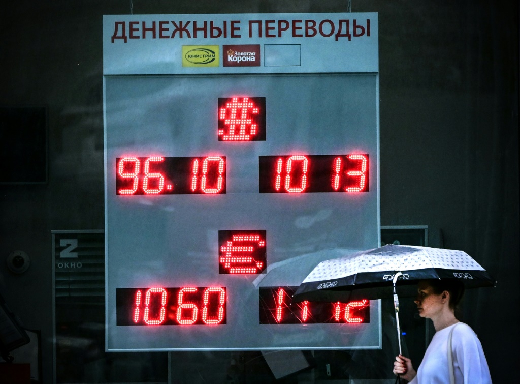 The Russian ruble slid past 100 against the dollar on August 14, 2023