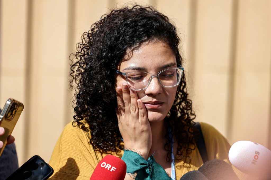 Sanaa Seif, sister of imprisoned British-Egyptian activist Alaa Abdel Fattah, speaks to reporters after a press conference on the sidelines of the COP27 climate conference in Egypt's Red Sea resort city of Sharm el-Sheikh