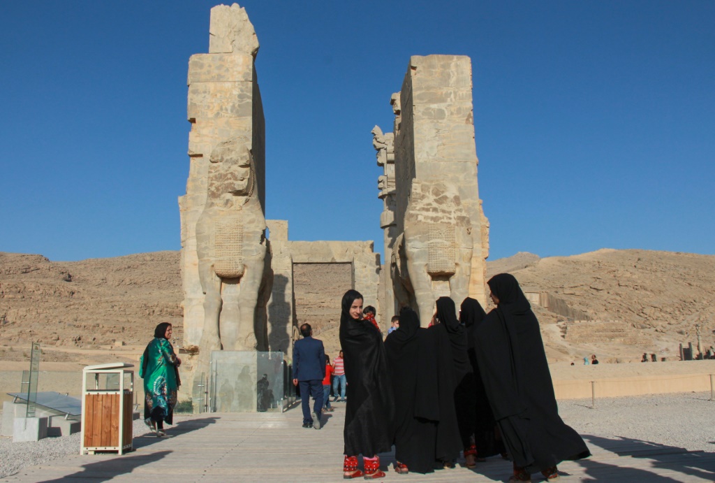 Tourists visit the archaeological site of Persepolis