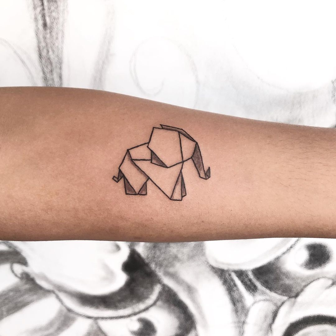 Little elephant tattoo on Annette's wrist.
