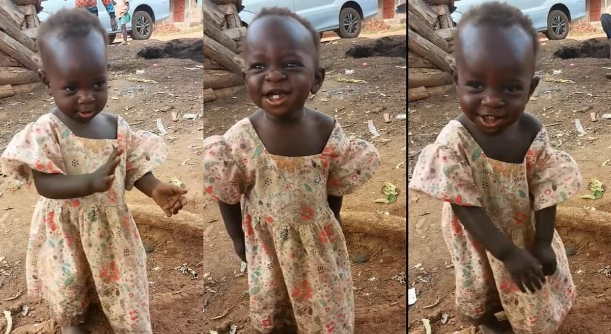 Photos of a little girl posing for a dance in public.
