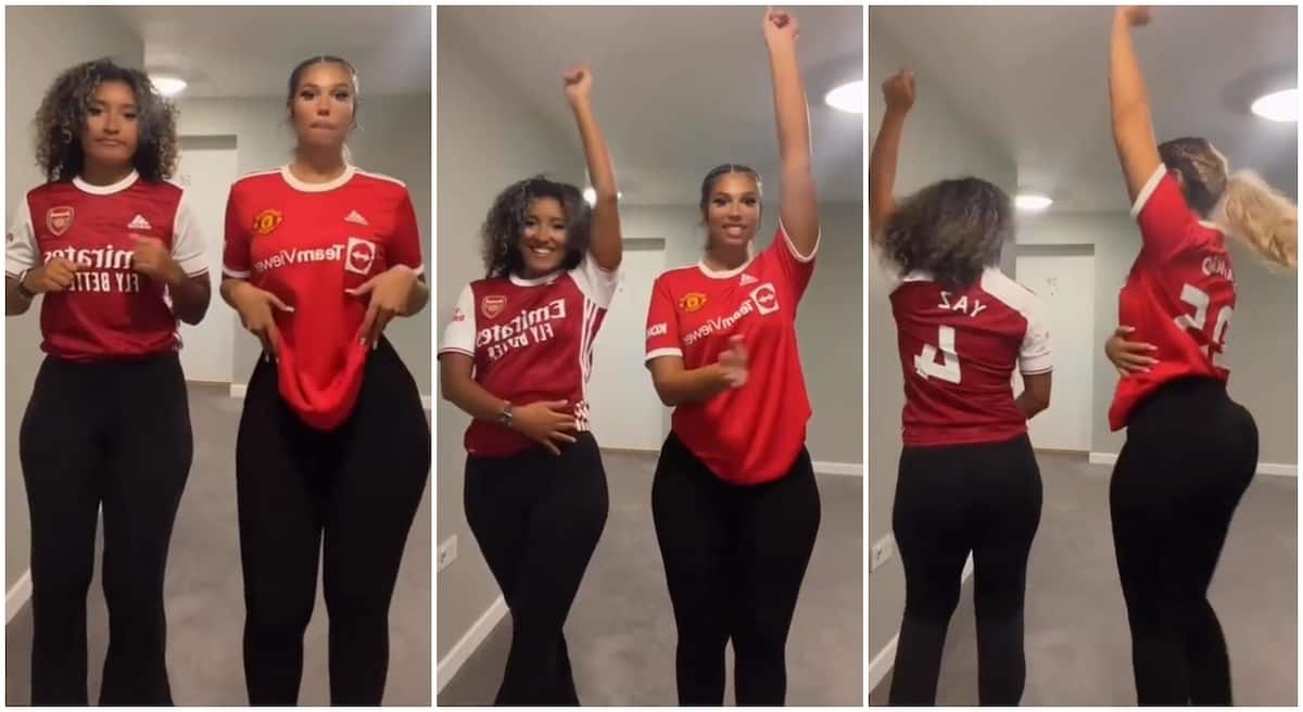 Pretty ladies in Arsenal and Manchester United jerseys.