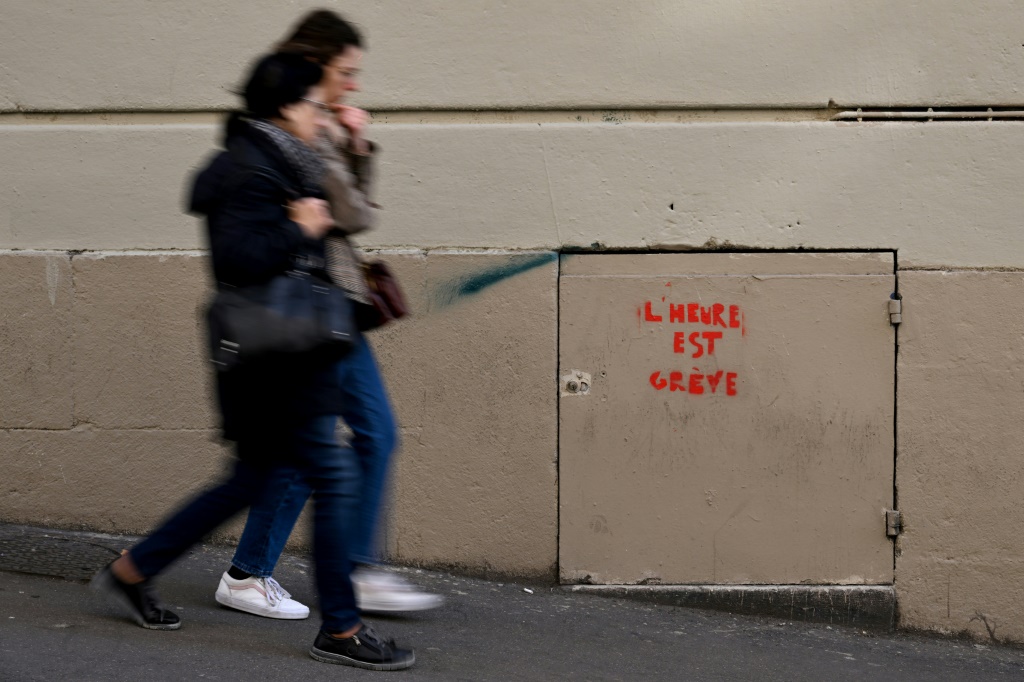 'Time to strike': A grafittied pun in the southern French city of Marseille calls on people to protest