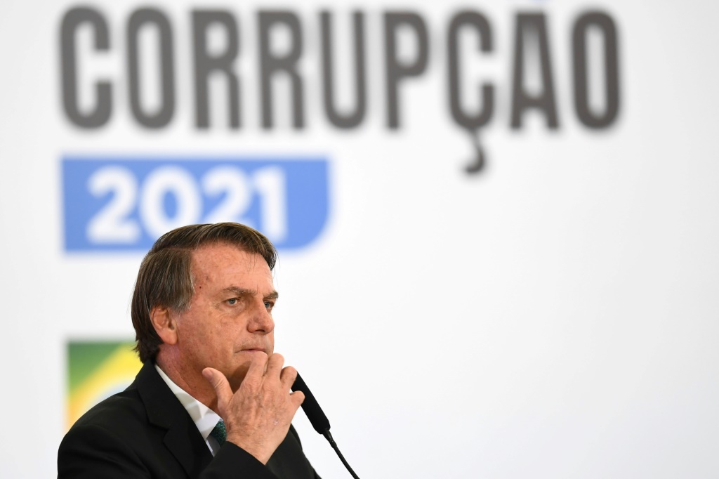 Bolsonaro -- seen here in December 2021 -- was elected on an anti-corruption platform at a time when the country was reeling from a massive graft scandal