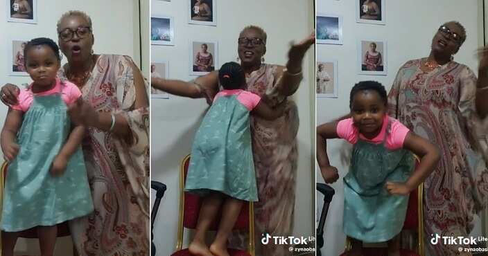 Nigerian mum dances with her adopted child