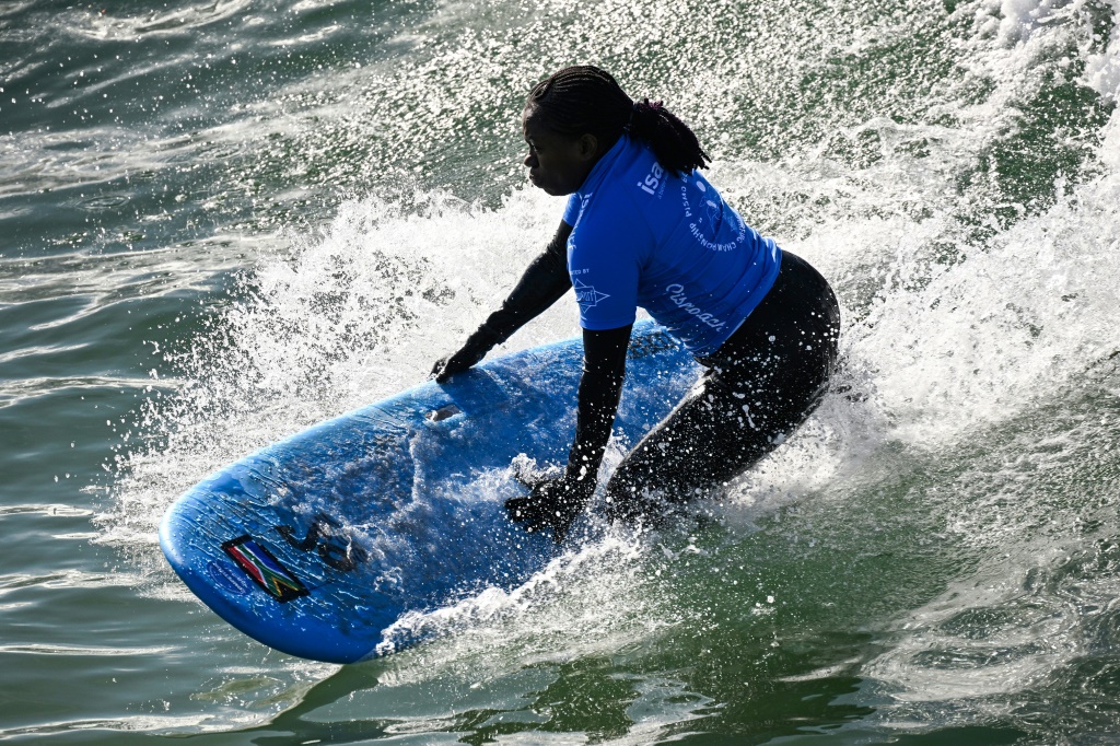 South African athlete Similo Dlamini competes in her first World Para Surfing Championship in Pismo Beach, California