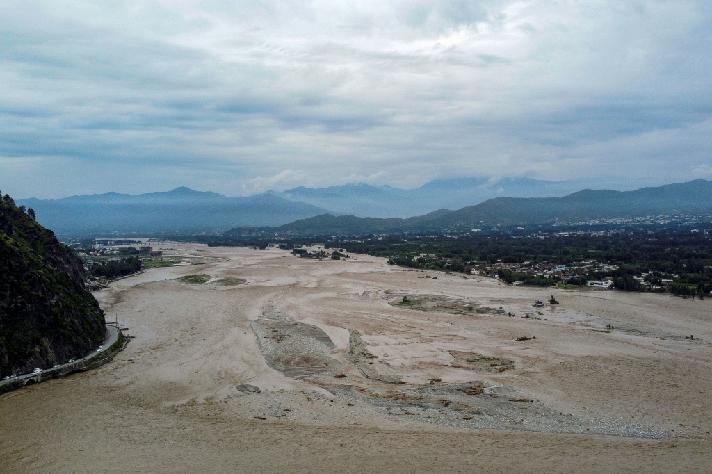The Swat River became a raging torrent, swallowing up dozens of buildings, including hotels perched on its banks