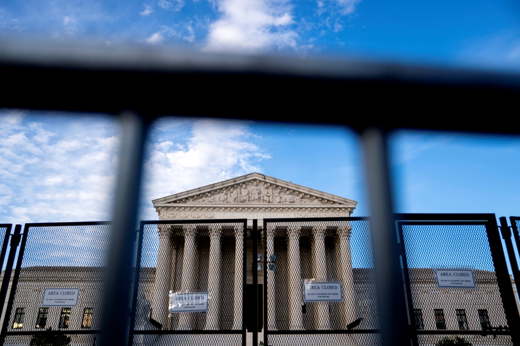 The US Supreme Court, protected from protesters by temporary fencing