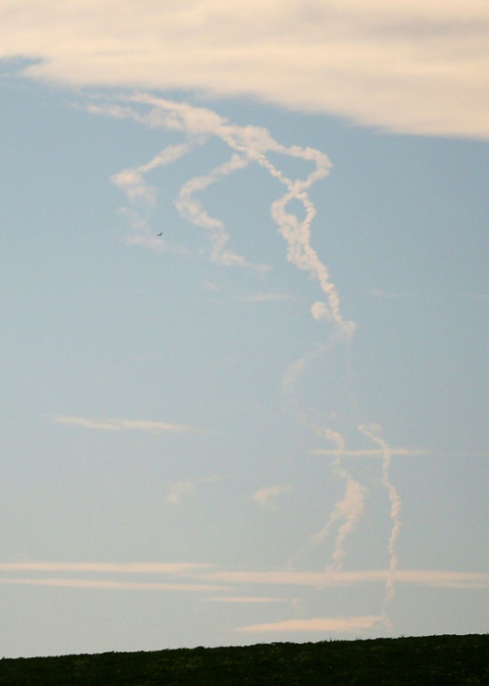 Rockets trails are seen in the sky in Ukraine's eastern Donbas region