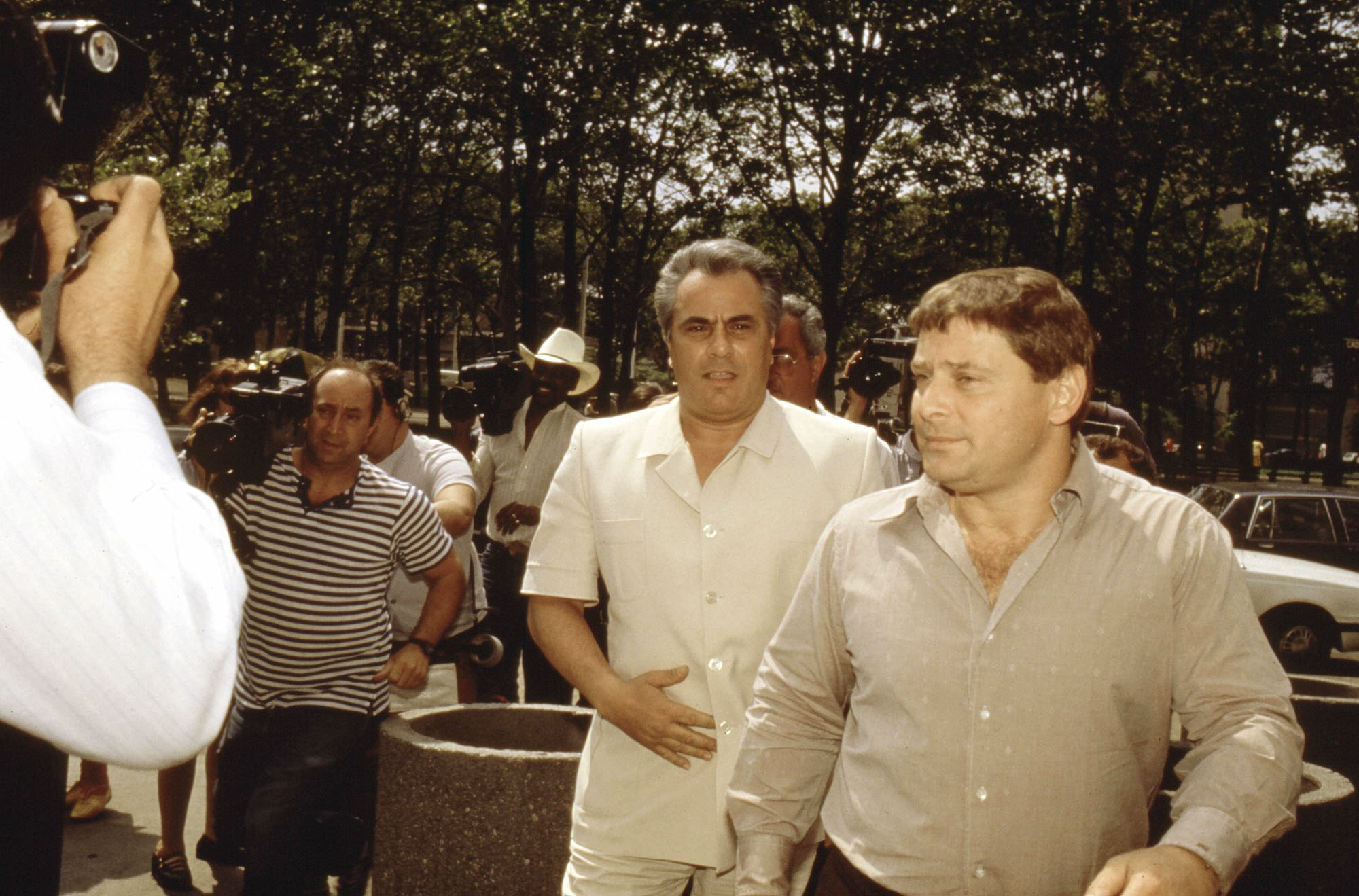 John Gotti enters the Brooklyn Federal courthouse with Sammy "The Bull" Gravano (right) in New York City
