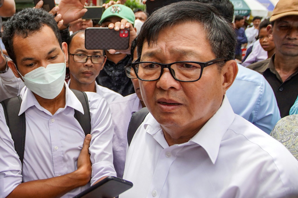 Cambodian opposition politician Son Chhay speaks outside court in Phnom Penh on Friday