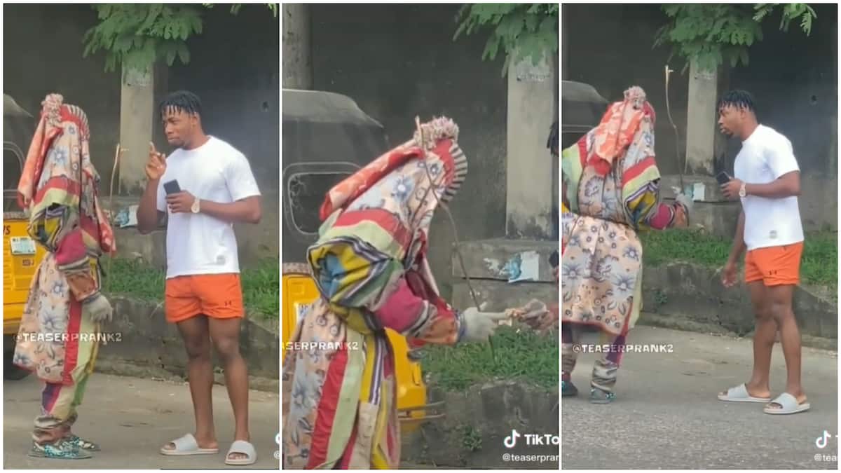 Pranking people in the street/masquerade interracts with man.