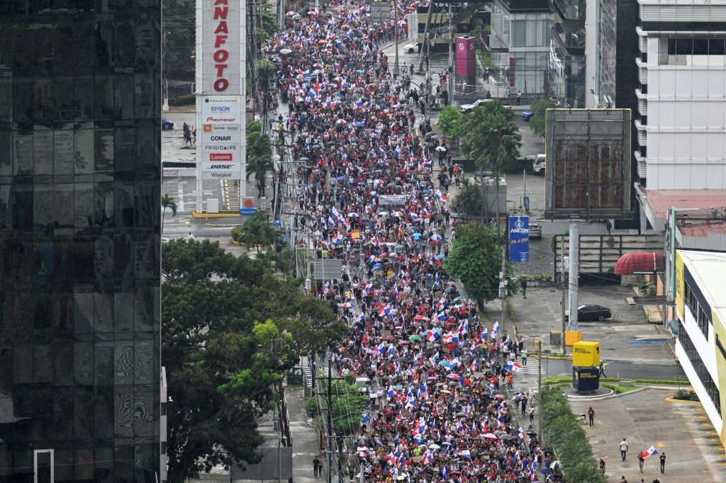 Panamanian protesters march against a government contract with a Canadian mining giant in Panama City on October 27, 2023
