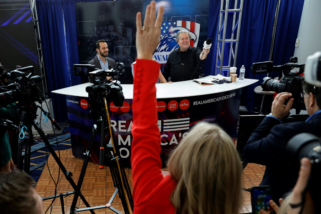 Steve Bannon (R), former advisor to former US president Donald Trump, hosts his War Room podcast live during the Conservative Political Action Conference on March 2, 2023 in National Harbor, Maryland