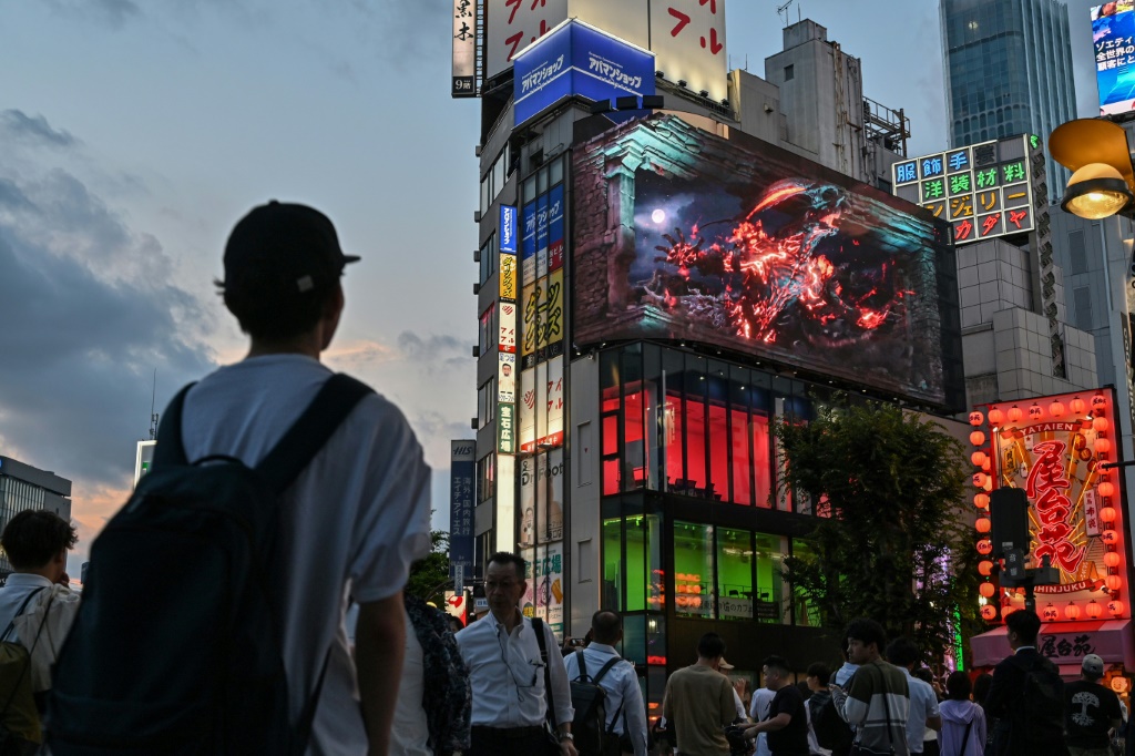 Final Fantasy XVI, seen advertised on a digital screen in Tokyo, has been described as the most grown up edition of the hit series yet