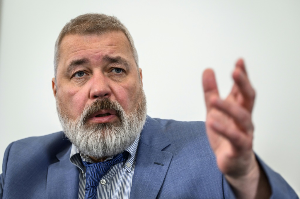 2021 Nobel Peace Prize laureate Dmitry Muratov, shown here in Geneva in May 2022, will auction off his award medal to benefit children displaced by the war in Ukraine