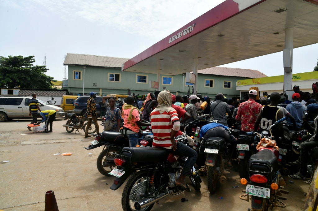 Consumers rushed to buy petrol on Tuesday after newly-elected President Bola Tinubu announced the end to Nigeria's costly fuel subsidies