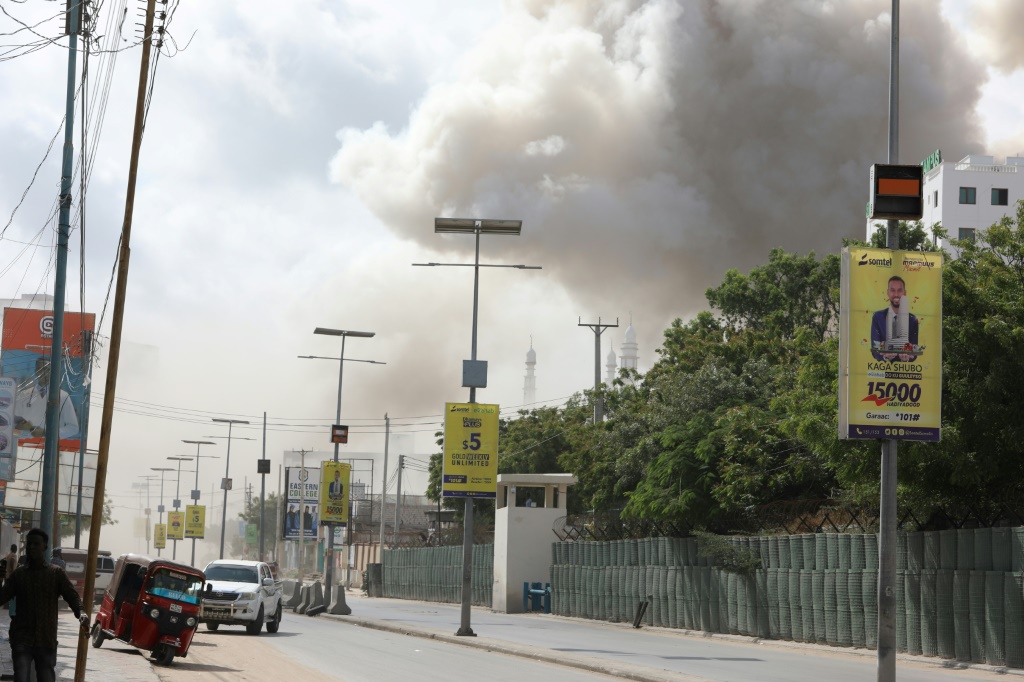 Two cars packed with explosives were detonated minutes apart near Mogadishu's busy Zobe junction
