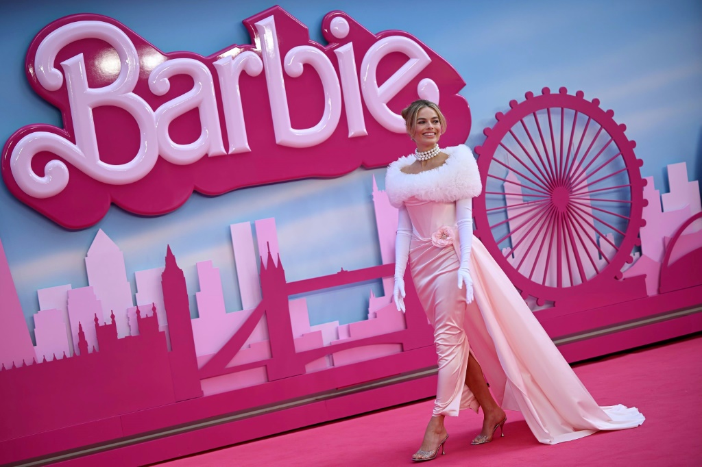 Australian actress Margot Robbie poses for a photo during the premier of "Barbie" in London