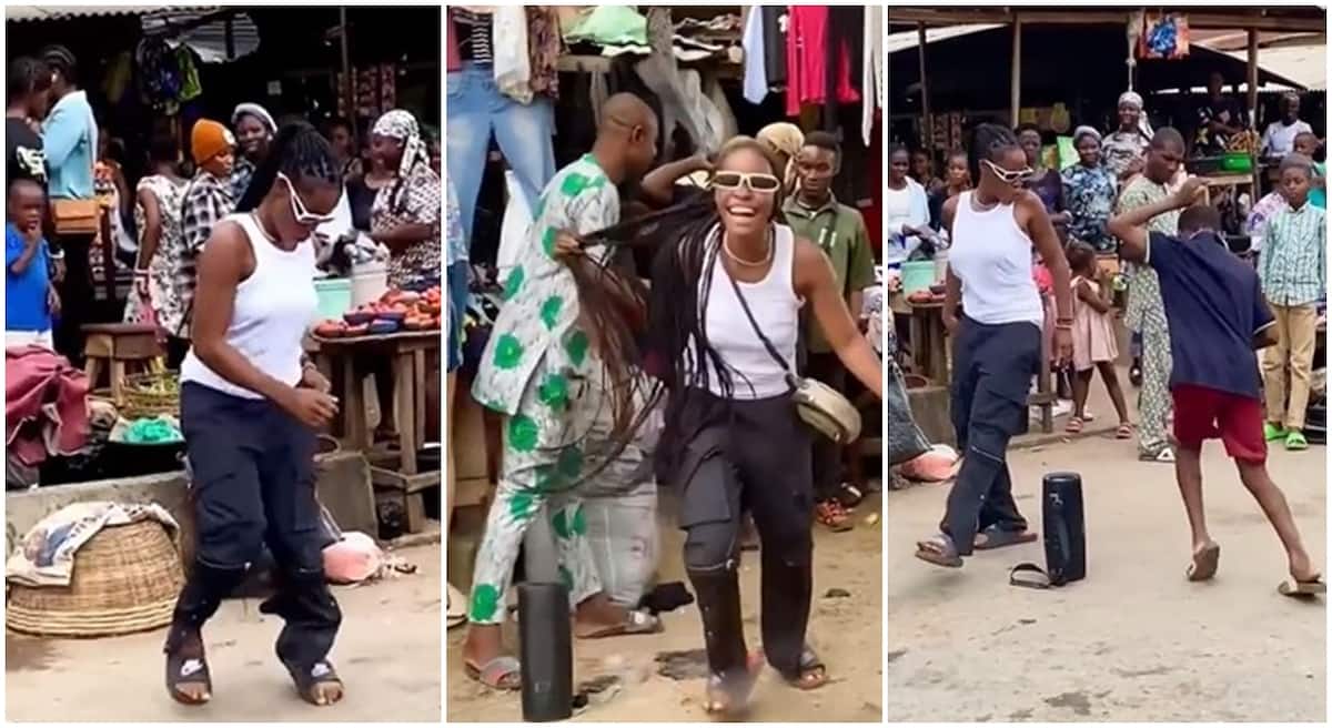 Nigerian lady dances inside market in Ikorodu, Lagos.