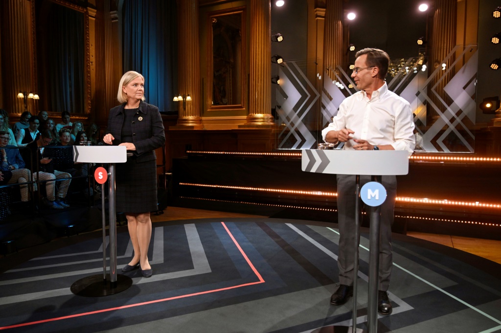 Swedish Prime Minister and leader of the Social Democrats Magdalena Andersson (L) and leader of the conservative Moderate party Ulf Kristersson debate on September 10, 2022, one day ahead of the general elections