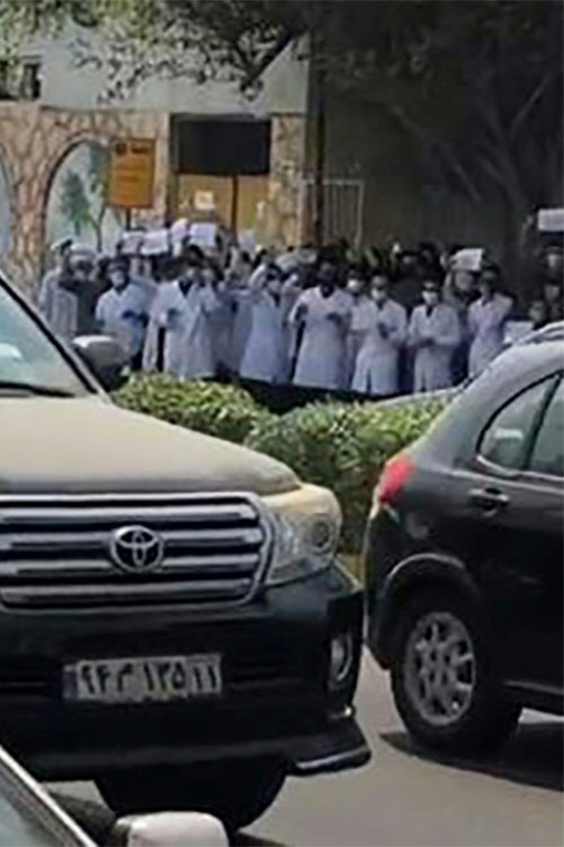This grab taken from a video posted on Twitter on October 3, 2022 reportedly shows Iranian students during a protest in the southern Iranian port city of Bandar Abbas