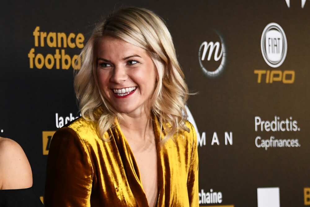 Ada Hegerberg poses upon arrival at the Ballon d'Or award ceremony